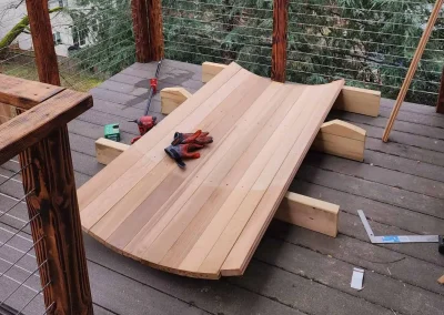 Seattle outdoor sauna construction in progress – custom-built wooden barrel sauna setup on a deck.