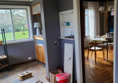 Original Redmond kitchen before remodel showing the dividing wall and doorway separating it from the formal dining room