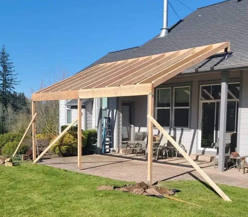 Seattle covered patio shingle roof cedar in progress e1783871057449